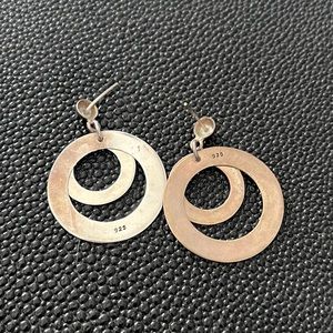 Stirring silver 925 stamped earrings.